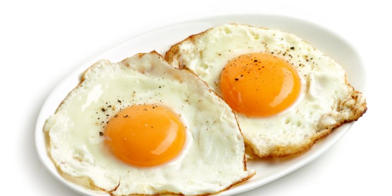 Two fried eggs on a plate